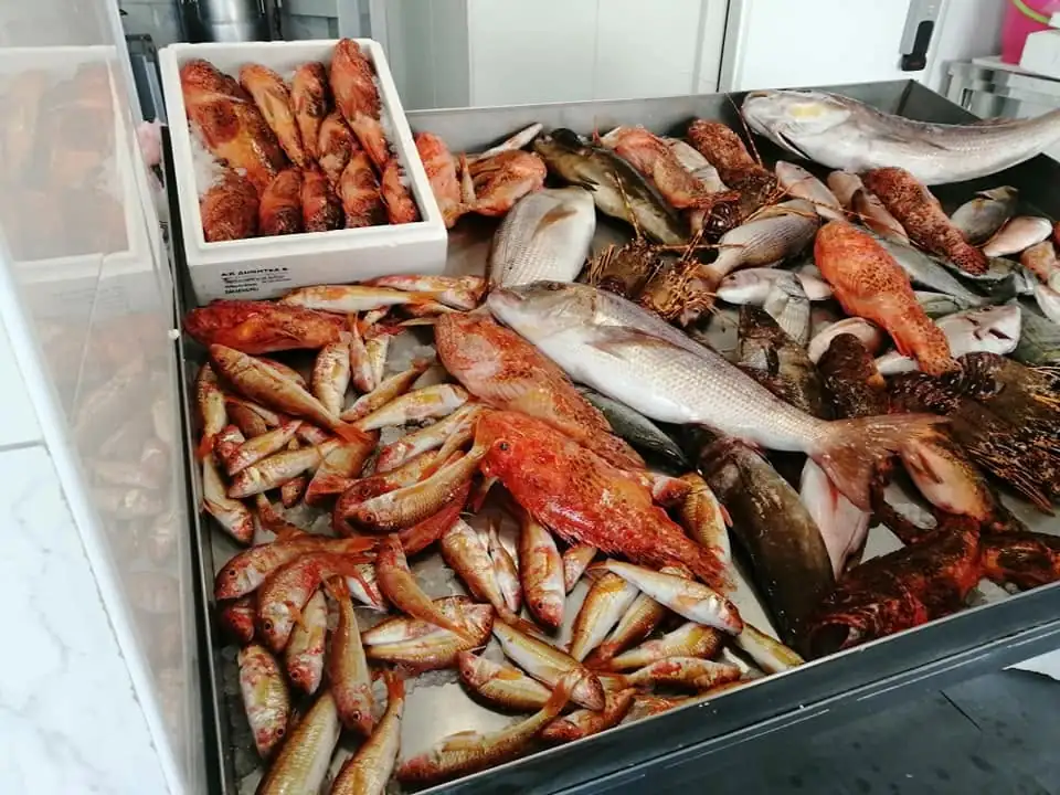 Aegean seafood display counter at Skiathos Fish Market in Skiathos Town